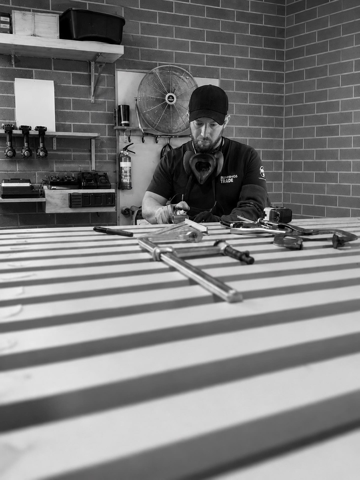 Reuben fabricating a batten gate on the workshop bench